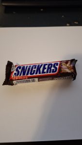 "Single Snickers Milk Chocolate Candy Bar with peanuts, caramel, nougat, and milk chocolate coating"